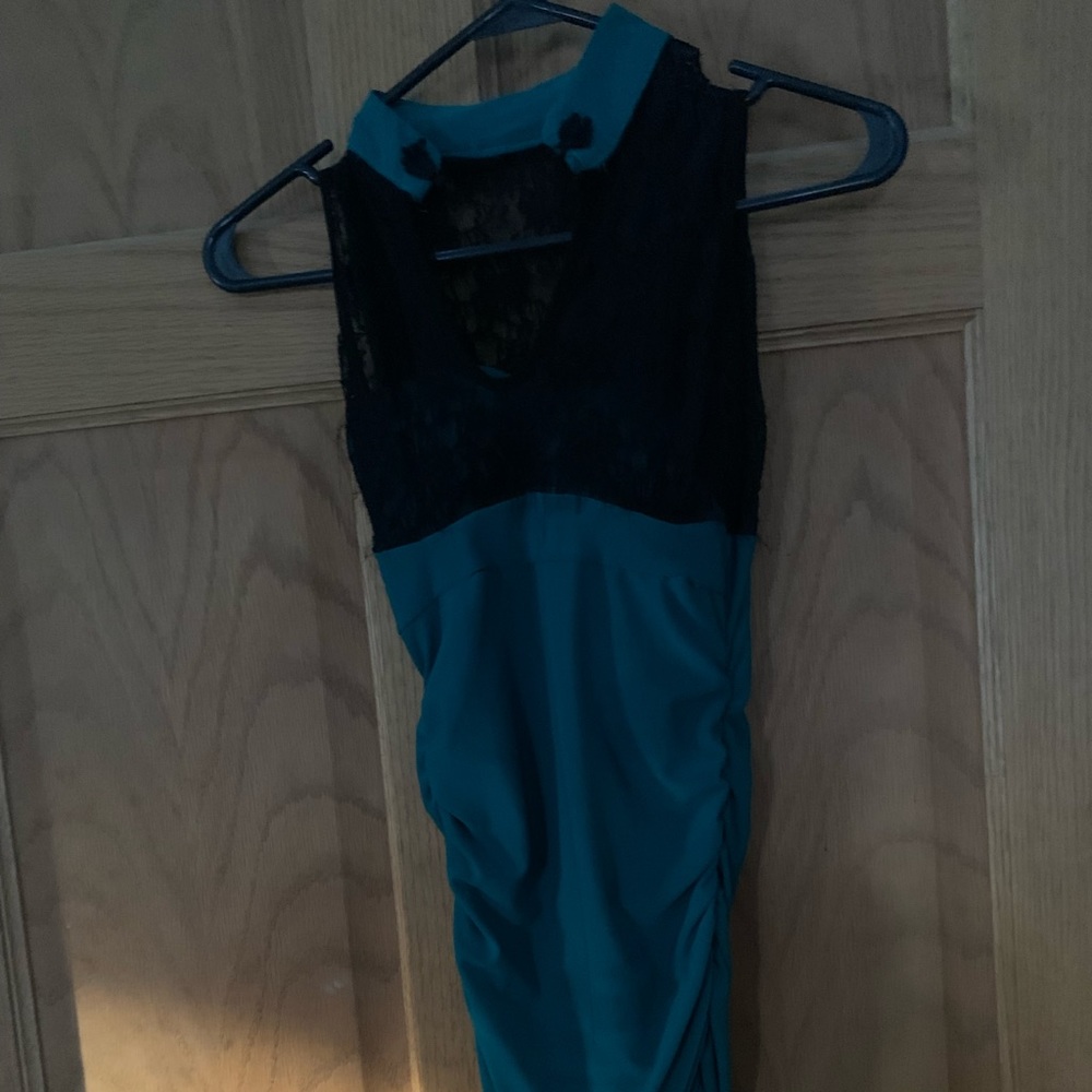 Green and black lace dress